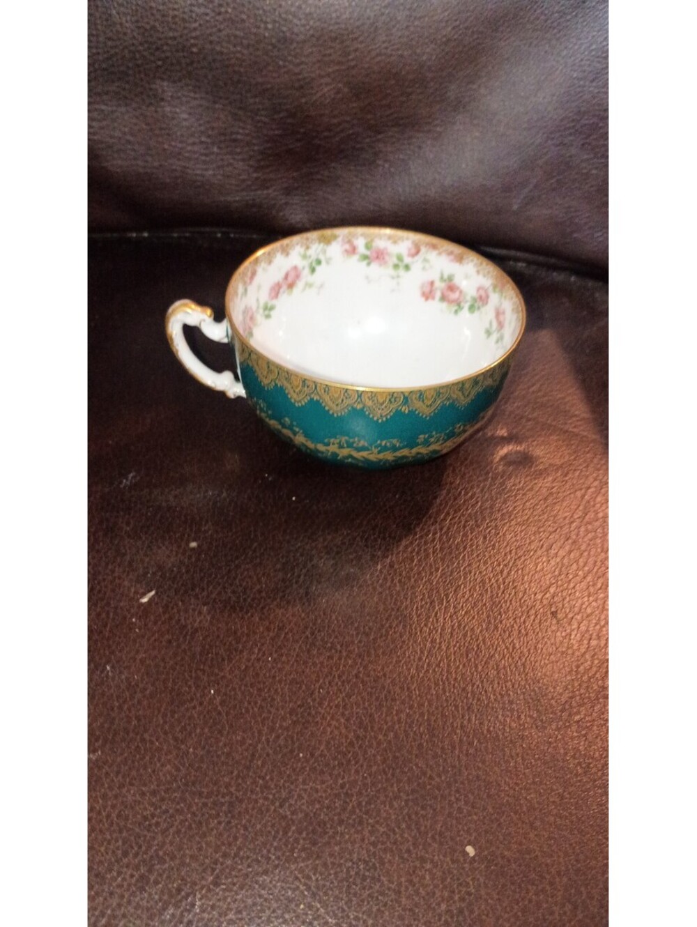 Vintage Style Porcelain Tea Cup with Floral and Gold Detailing